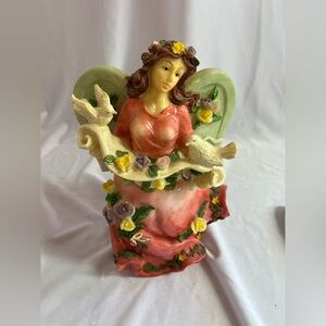 Vibrant Angel Figurine with Floral Accents
